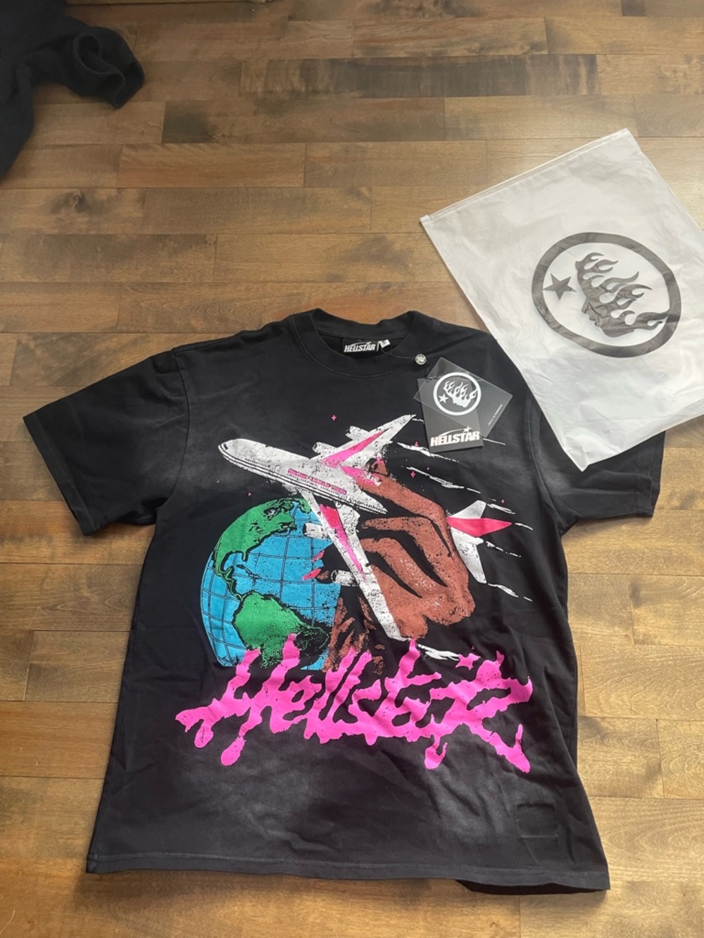 Hellstar Men’s Black Short-Sleeve Graphic Tee with Globe & Plane